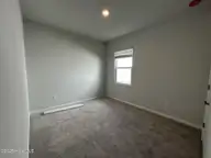 555 Coronado Avenue SE, Leland, NC 28451 — 4-bedroom home in Herring Shores, Leland, NC, photo 16 of 18: Bedroom 4