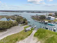 222 Hughes Road, Hampstead, NC 28443 — 3-bedroom waterfront home in Washington Acres, Hampstead, NC, photo 5 of 55: 65-web-or-mls-DJI_20260324120449_0836_D