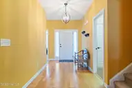 17 Picket Fence Lane, Calabash, NC 28467 — 3-bedroom waterfront home in The Farm, Calabash, NC, photo 8 of 37: Front Hallway