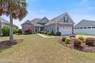 7138 Sevilleen Drive SW, Ocean Isle Beach, NC 28469 — 4-bedroom home in Sunset Ridge, Ocean Isle Beach, NC, photo 1 of 56: Front view