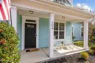 204 N Brig Drive, Hampstead, NC 28443 — 4-bedroom home in Saltwater Landing, Hampstead, NC, photo 8 of 37: Covered Porch