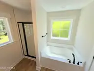 316 Hawks Bluff Drive, New Bern, NC 28560 — 3-bedroom home in Falcon Bridge, New Bern, NC, photo 17 of 21: Primary bath