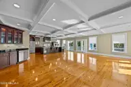 185 Seawatch Way, Kure Beach, NC 28449 — 5-bedroom waterfront home in Seawatch, Kure Beach, NC, photo 6 of 72: 30_living room