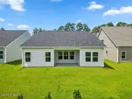 1082 Rosefield Way NW, Carolina Shores, NC 28467 — 3-bedroom home in Calabash Station, Carolina Shores, NC, photo 15 of 26: rear