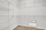 3048 Coastal Dream Way, Leland, NC 28451 — 4-bedroom townhome in Grand Park, Leland, NC, photo 11 of 39: Primary Closet