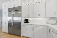 109 Ocean Bluff Drive, Indian Beach, NC 28512 — 6-bedroom waterfront home in Ocean Bluff, Indian Beach, NC, photo 14 of 57: Kitchen