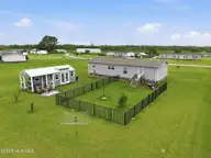 203 Magnolia Drive, Stella, NC 28582 — 3-bedroom manufactured home in Stella Farms, Stella, NC, photo 6 of 40: 7-web-or-mls-DJI_20260601122027_0021_D