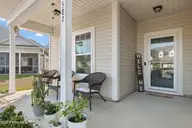 587 Meadowbrook Lane NW, Calabash, NC 28467 — 3-bedroom home in Meadowlands, Calabash, NC, photo 8 of 43: Front Door