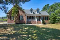 39 Winding Trail, Whispering Pines, NC 28327 — 4-bedroom home in Whispering Winds, Whispering Pines, NC, photo 2 of 49: 1-1_39 Winding Trail, Carthage, NC 28327