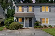 128 Lullwater Drive Unit B, Wilmington, NC 28403 — 2-bedroom condo in Lullwater Village, Wilmington, NC, photo 1 of 14