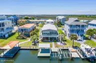 4090 4th Street, Surf City, NC 28445 — 4-bedroom waterfront manufactured home in Old Settlers Beach, Surf City, NC, photo 11 of 55: 052_dji_0427_547