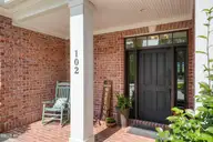 102 Reflection Court SW, Ocean Isle Beach, NC 28469 — 4-bedroom home in Ocean Ridge Plantation, Ocean Isle Beach, NC, photo 3 of 77: 005-20250822-100_a7409051_skyvue