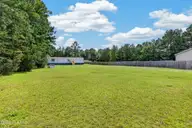 125 Woodleaf Lane, Jacksonville, NC 28540 — 3-bedroom manufactured home in King Estates, Jacksonville, NC, photo 1 of 34