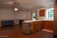 123 Daphne Drive, Hubert, NC 28539 — 3-bedroom home in Foxlair, Hubert, NC, photo 9 of 27: Kitchen/Livingroom