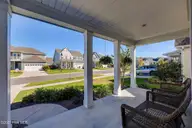 1369 Trisail Terrace, Wilmington, NC 28412 — 4-bedroom home in Riverlights, Wilmington, NC, photo 4 of 39: Front Porch Looking Out