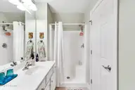 1121 Sandy Beach Circle, Leland, NC 28451 — 3-bedroom waterfront townhome in Waterford of the Carolinas, Leland, NC, photo 21 of 58: Upstairs Bathroom