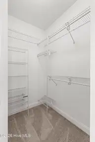 112 Oakleaf Drive 1003-A, Pine Knoll Shores, NC 28512 — 2-bedroom waterfront condo in Shutters OS, Pine Knoll Shores, NC, photo 16 of 58: Master Bedroom - walk in closet