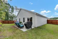 5260 Soy Bean Drive NE, Winnabow, NC 28479 — 4-bedroom home in Country Walk, Winnabow, NC, photo 22 of 24: Back Exterior