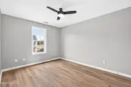 103 Lincoln Place Circle, Leland, NC 28451 — 3-bedroom townhome in Lincoln Place Townhomes, Leland, NC, photo 24 of 41: Bedroom 2