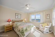 1711 E Fort Macon Road, Atlantic Beach, NC 28512 — 4-bedroom waterfront home in Asbury Beach, Atlantic Beach, NC, photo 22 of 42: Sound view Bedroom