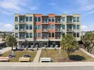 102 Cape Fear Boulevard Unit 301, Carolina Beach, NC 28428 — 1-bedroom condo in Towne Place Condominium, Carolina Beach, NC, photo 1 of 47: Exterior Picture