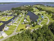 2831 Whichards Beach Road, Chocowinity, NC 27817 — 3-bedroom waterfront manufactured home in Portside, Chocowinity, NC, photo 4 of 53: 15-web-or-mls-DJI_20260602145454_0151_D