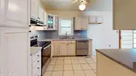 109 London Lane, Jacksonville, NC 28546 — 3-bedroom home in Long Acres, Jacksonville, NC, photo 16 of 35: 109-London-Lane-Kitchen