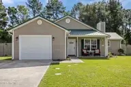 218 Palamino Trail, Jacksonville, NC 28546 — 4-bedroom home in Horse Creek Farms, Jacksonville, NC, photo 1 of 45: 1-web-or-mls-218 Palamino Trail 84