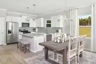 333 Eagle Claw Drive 4037, Carolina Shores, NC 28467 — 3-bedroom home in Eagle Run, Carolina Shores, NC, photo 6 of 23: Compton - Kitchen & Cafe