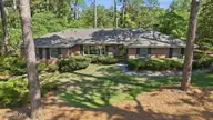 59 Pine Ridge Drive, Whispering Pines, NC 28327 — 2-bedroom home in Whispering Pines, Whispering Pines, NC, photo 2 of 71: 2-web-or-mls-DJI_20260630163616_0462_D