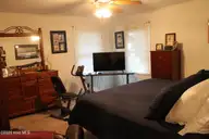 530 Woodfield Road, Whiteville, NC 28472 — 3-bedroom home in Runnymeade, Whiteville, NC, photo 8 of 23: Primary bedroom 2
