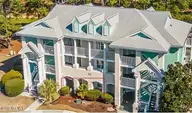 330 S Middleton Drive NW Unit 1002, Calabash, NC 28467 — 2-bedroom condo in Brunswick Plantation, Calabash, NC, photo 1 of 2: Condo Front