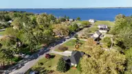 201 Gaston Drive, Elizabeth City, NC 27909 — 3-bedroom home in Newbegun Land, Elizabeth City, NC, photo 5 of 45: 5_dji_20260402164858_0004_d