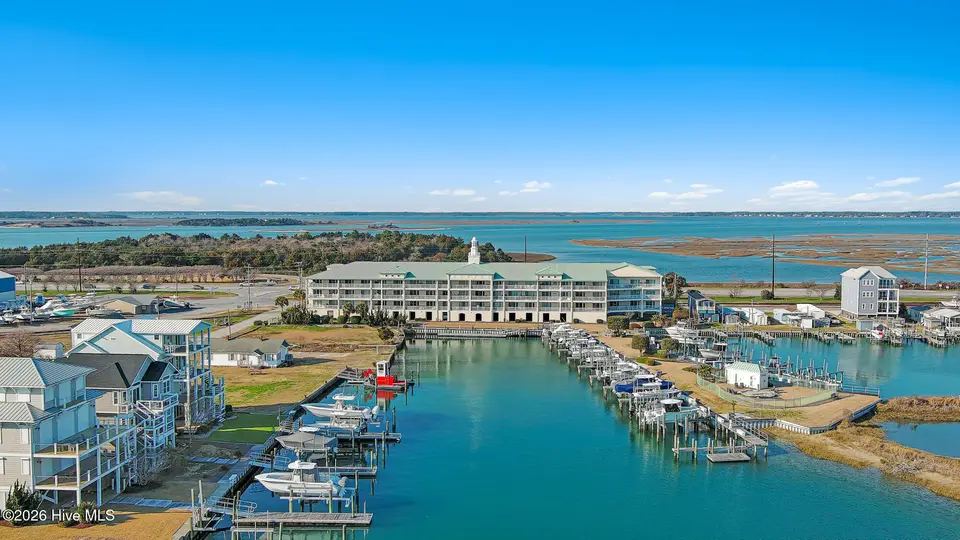 212 Old Causeway Road 107 & B13 Slip, Beaufort, NC 28516 — 3-bedroom waterfront condo in Morgan Creek Landing, Beaufort, NC, photo 1 of 49: Morgan Creek Landings 107