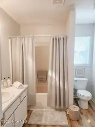 243 Parnell Road, Hubert, NC 28539 — 3-bedroom home in Foxtrace, Hubert, NC, photo 15 of 26: Primary Bath AI Staged