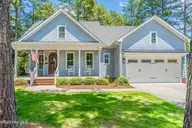 380 Lake Forest Drive SE, Pinehurst, NC 28374 — 4-bedroom home in Unit 10, Pinehurst, NC, photo 1 of 57: Front