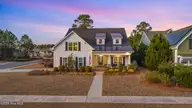 2169 Simmerman Way, Leland, NC 28451 — 3-bedroom home in Brunswick Forest, Leland, NC, photo 1 of 73: 1_dji_20260120174152_0055_d