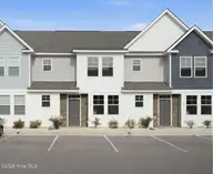 227 Sandy Cove Lane, Sneads Ferry, NC 28460 — 3-bedroom townhome in Beachside Commons, Sneads Ferry, NC, photo 1 of 30