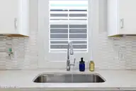 135 NE 75th Street, Oak Island, NC 28465 — 4-bedroom home in Tranquil Harbor, Oak Island, NC, photo 9 of 37: Kitchen