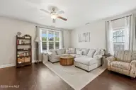 105 Gillcrest Lane, Hubert, NC 28539 — 3-bedroom home in Camden Woods, Hubert, NC, photo 4 of 32: Cozy living room