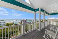 6612 Ocean Drive, Emerald Isle, NC 28594 — 3-bedroom waterfront home, Emerald Isle, NC, photo 16 of 49: Covered deck off of primary suite