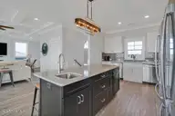 4005 E Beach Drive, Oak Island, NC 28465 — 7-bedroom waterfront home in E. Long Beach, Oak Island, NC, photo 10 of 65: Affinity 10