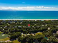 579 Coral Ridge Road, Pine Knoll Shores, NC 28512 — 4-bedroom waterfront home in Beacon's Reach, Pine Knoll Shores, NC, photo 3 of 62: Aerial View Facing Ocean