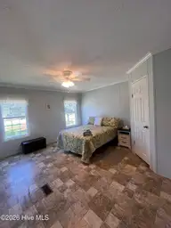 204 Diamond City Drive, Harkers Island, NC 28531 — 2-bedroom manufactured home in Earl Davis, Harkers Island, NC, photo 4 of 13: Primary Bedroom