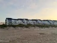 351 Salter Path Road 402, Pine Knoll Shores, NC 28512 — 3-bedroom waterfront condo in Bogue Shore Club, Pine Knoll Shores, NC, photo 11 of 15: View of Condos from Beach