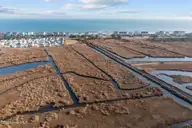 27 Hunter Heath Drive, North Topsail Beach, NC 28460 — waterfront lot in Ashe Island Farm, North Topsail Beach, NC, photo 19 of 21: Aerial View