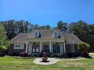 103 Wayfarer Drive, Rocky Point, NC 28457 — 3-bedroom waterfront home in River Landing, Rocky Point, NC, photo 1 of 5: front picture 5-4-26