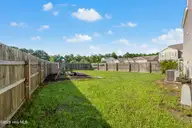 1699 Datchet Lane SE, Bolivia, NC 28422 — 4-bedroom home in New South Bridge, Bolivia, NC, photo 20 of 40: Back yard
