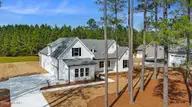 112 Antebellum Drive, Havelock, NC 28532 — 4-bedroom home in Plantation Harbor, Havelock, NC, photo 8 of 38: Exterior Front with Side Garage