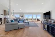217 Salter Path Road, Pine Knoll Shores, NC 28512 — 4-bedroom waterfront home in Pine Knoll Association, Pine Knoll Shores, NC, photo 4 of 62: Living Room